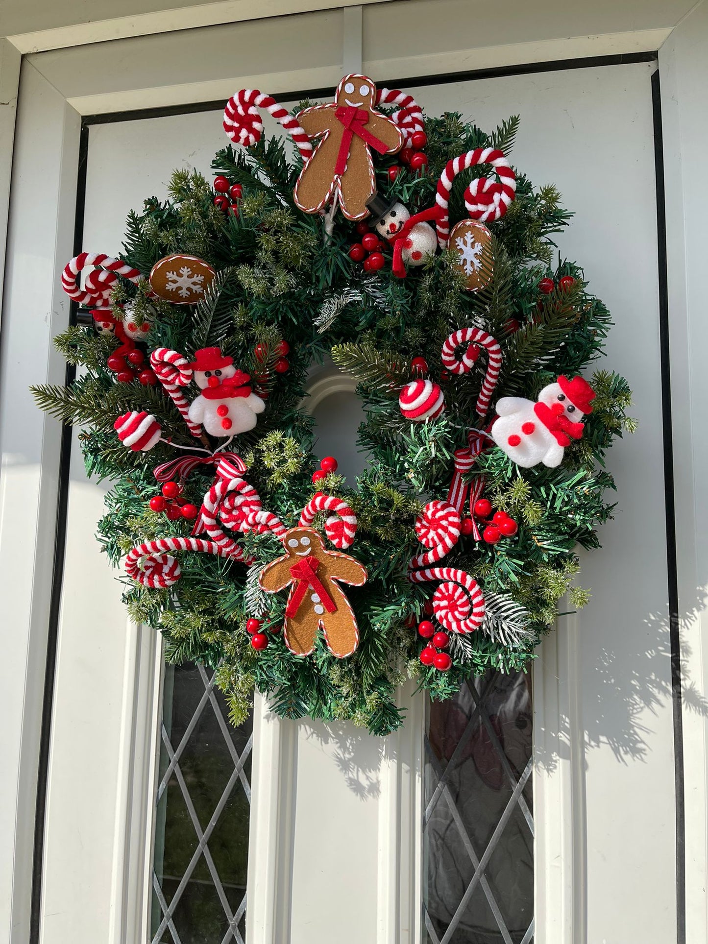 Christmas deluxe wreaths different themes available medium size.